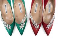 Two Pairs of Manolo Blahnik Satin Heels and Two Matching Clutches