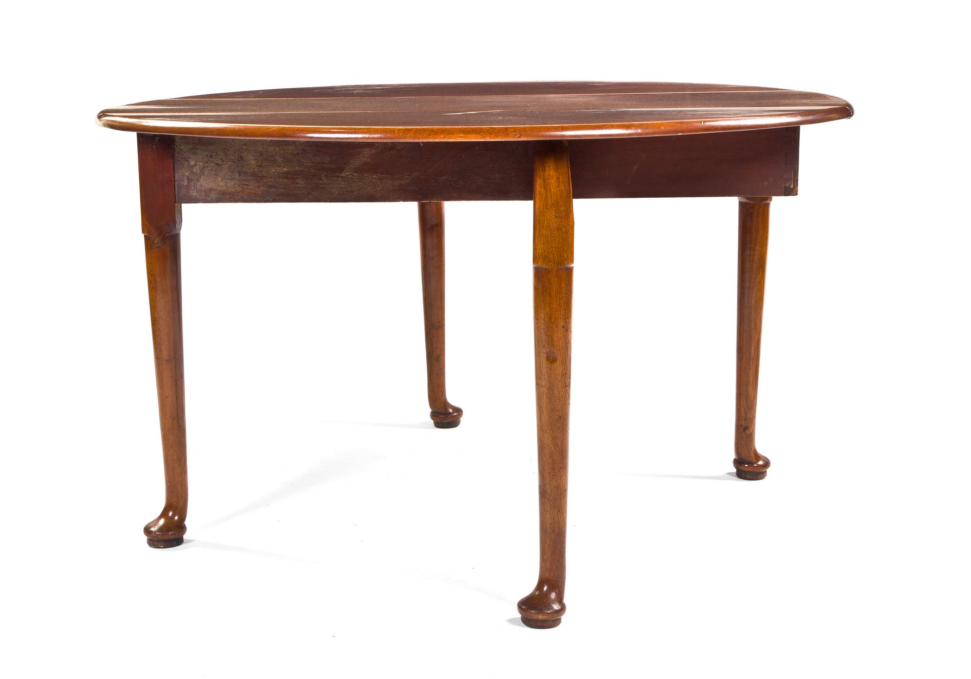 A Queen Anne Style Mahogany Drop-Leaf Table, Height 27 x width 47 1/2 x depth 17 1/2 inches.