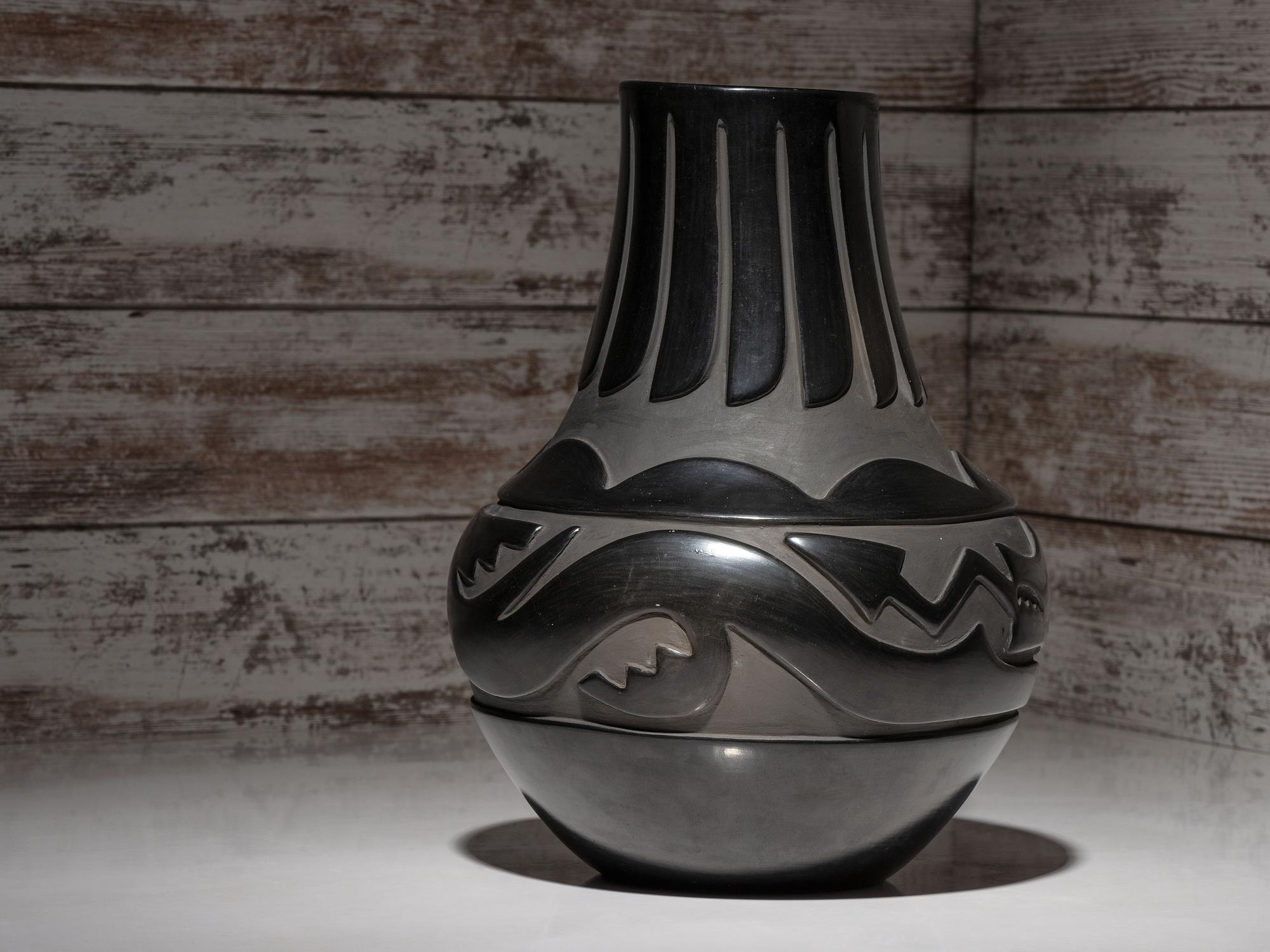 Carve Blackware Pottery Jar, with Avanyu