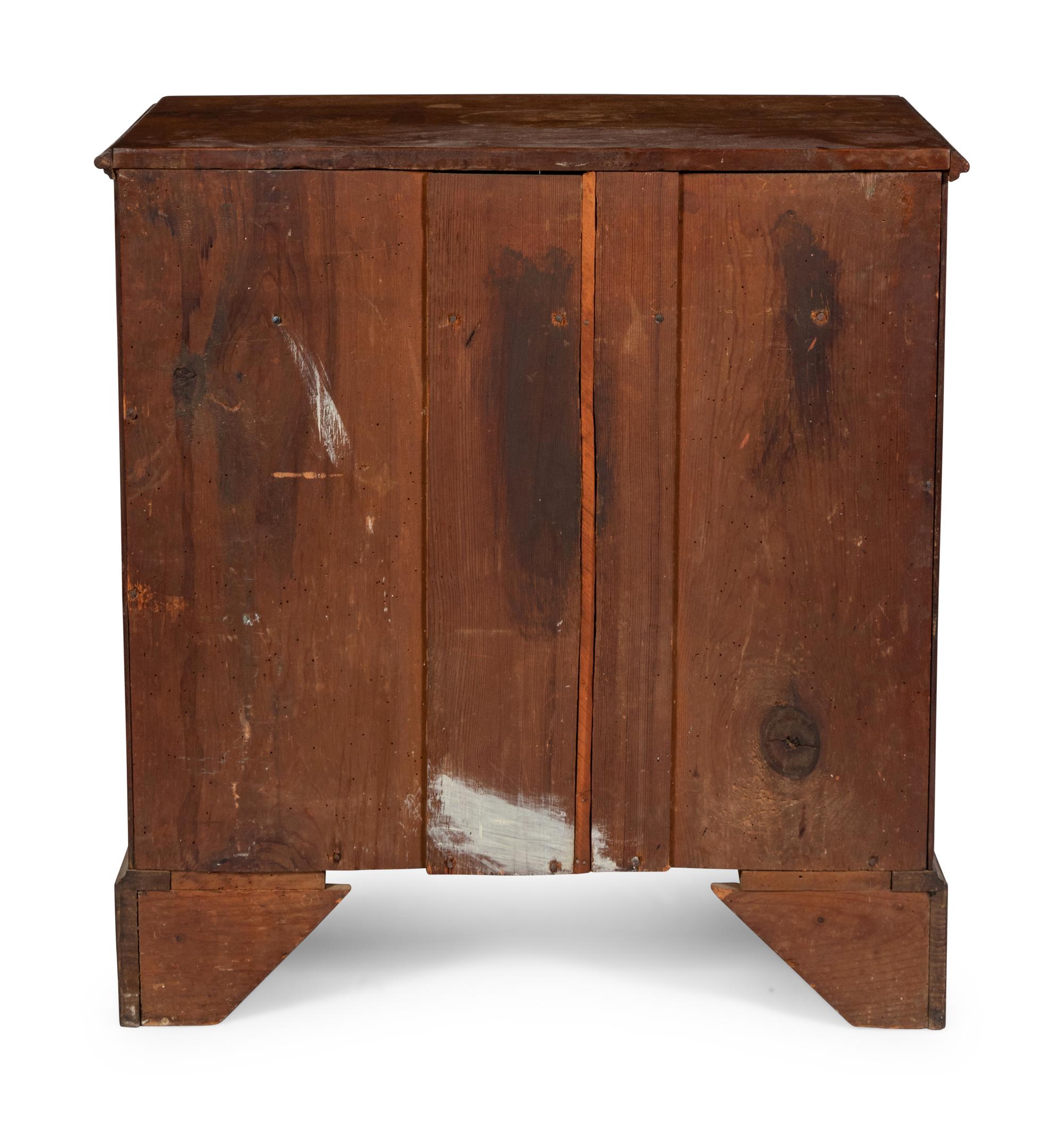 A Chippendale Walnut Chest of Drawers