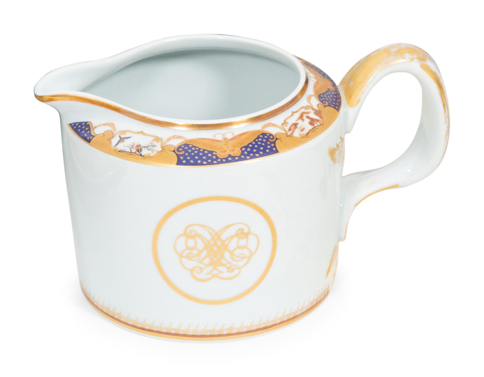A Mottahedeh Porcelain Golden Butterfly Dinner Service