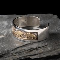 Watson Honanie (Hopi, 1953-2023) — Sterling Silver with 14K Gold Overlay Cuff Bracelet, with Bear Scene