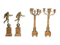 A Pair of Brass and Marble Cherub Bookends and Four-Light Candelabra