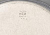 Eight American Silver Bread Plates
