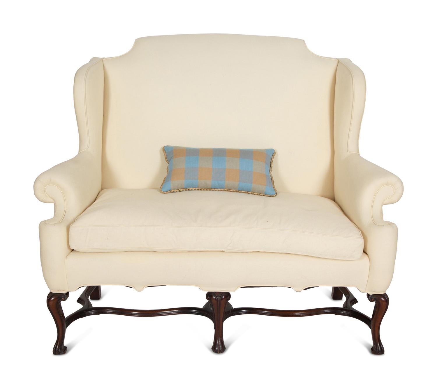 A William & Mary Style Carved Oak Upholstered Wing Back Settee
