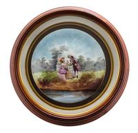 A Continental Porcelain Charger Diameter 11 1/2 inches. — EARLY 20TH CENTURY