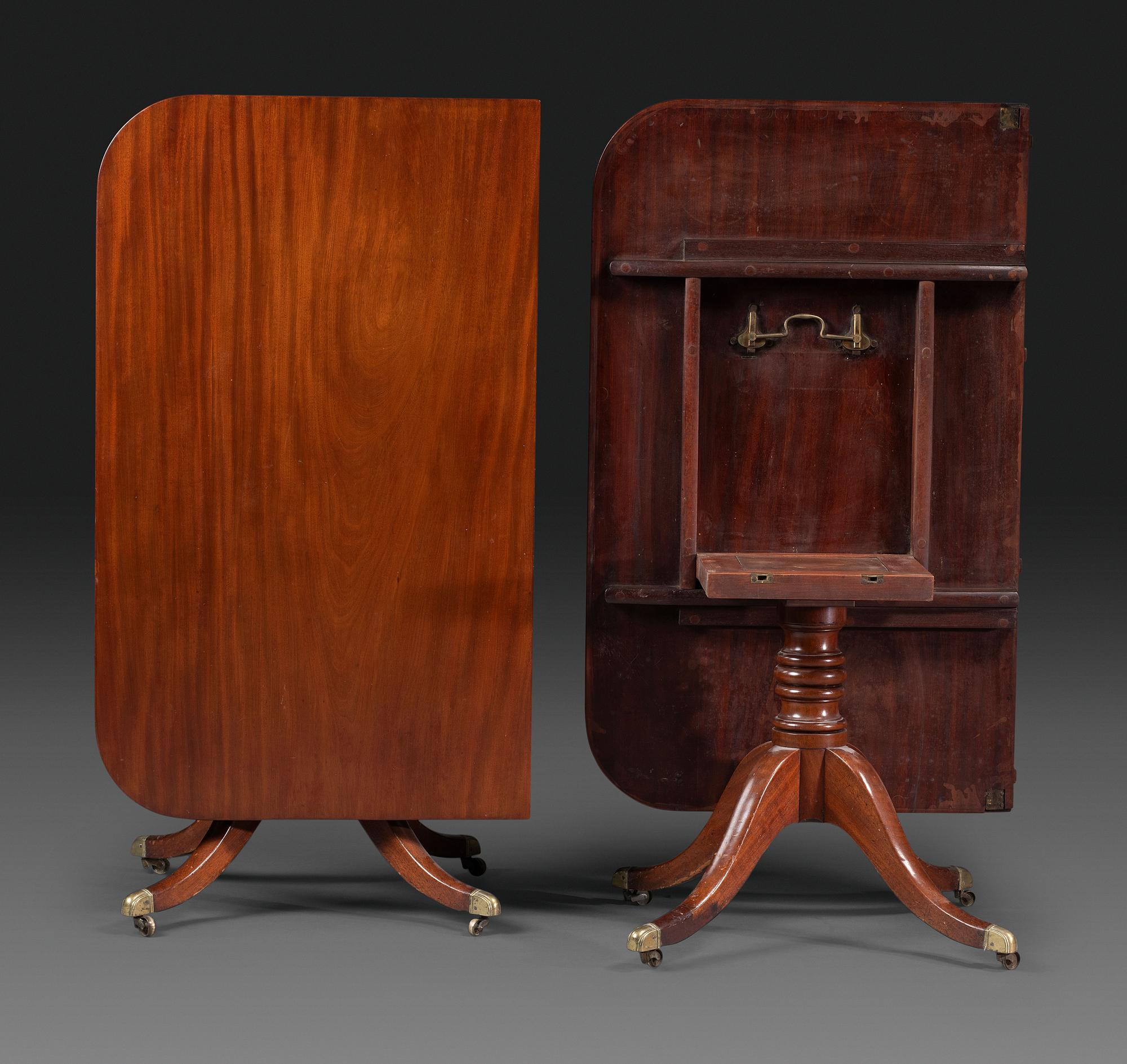 A Federal Mahogany Double Pedestal Extension Dining Table