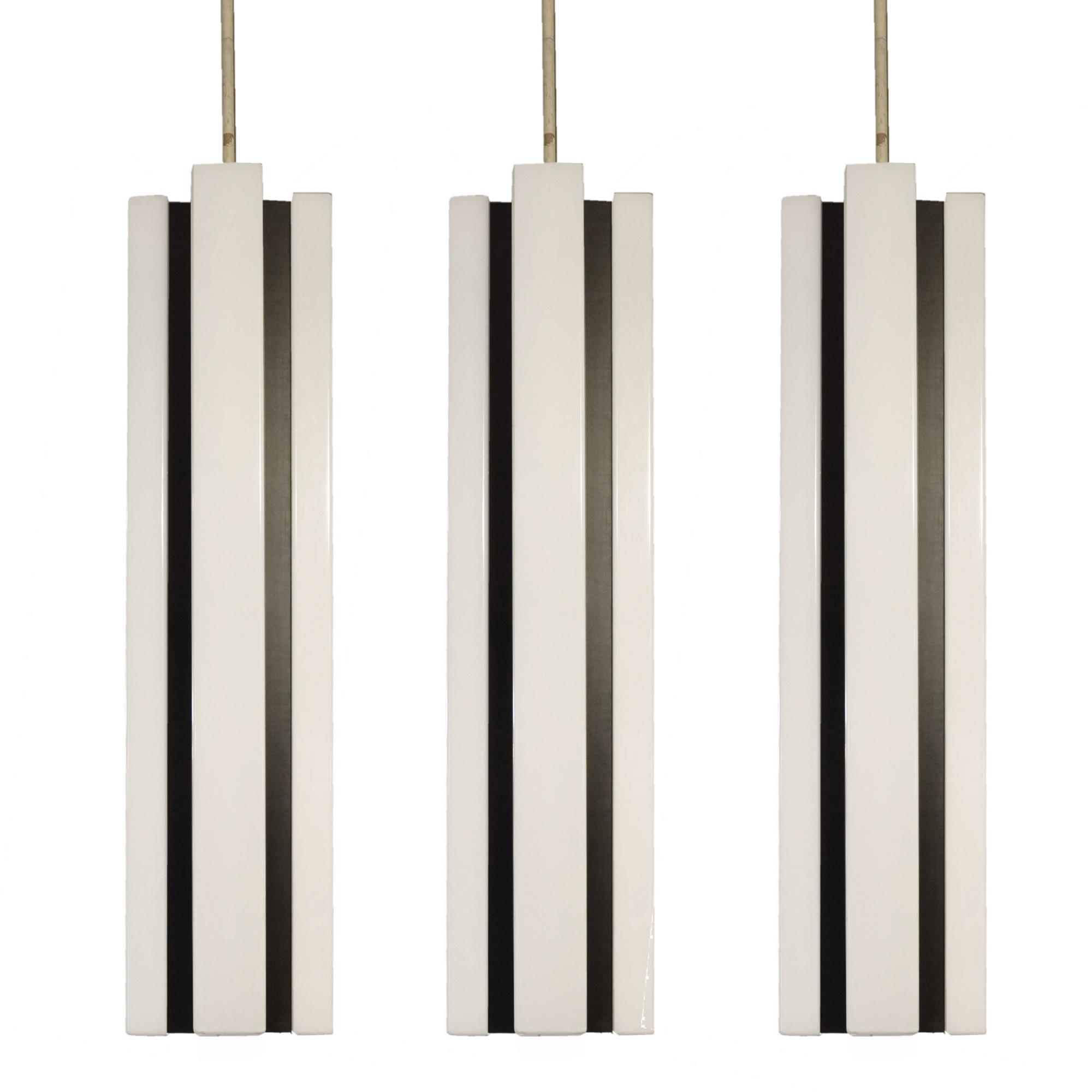A Set of Three Mid-Century Plastic Light Fixtures 12" W x 12" D x 51" H — Germany, Mid-20th Century