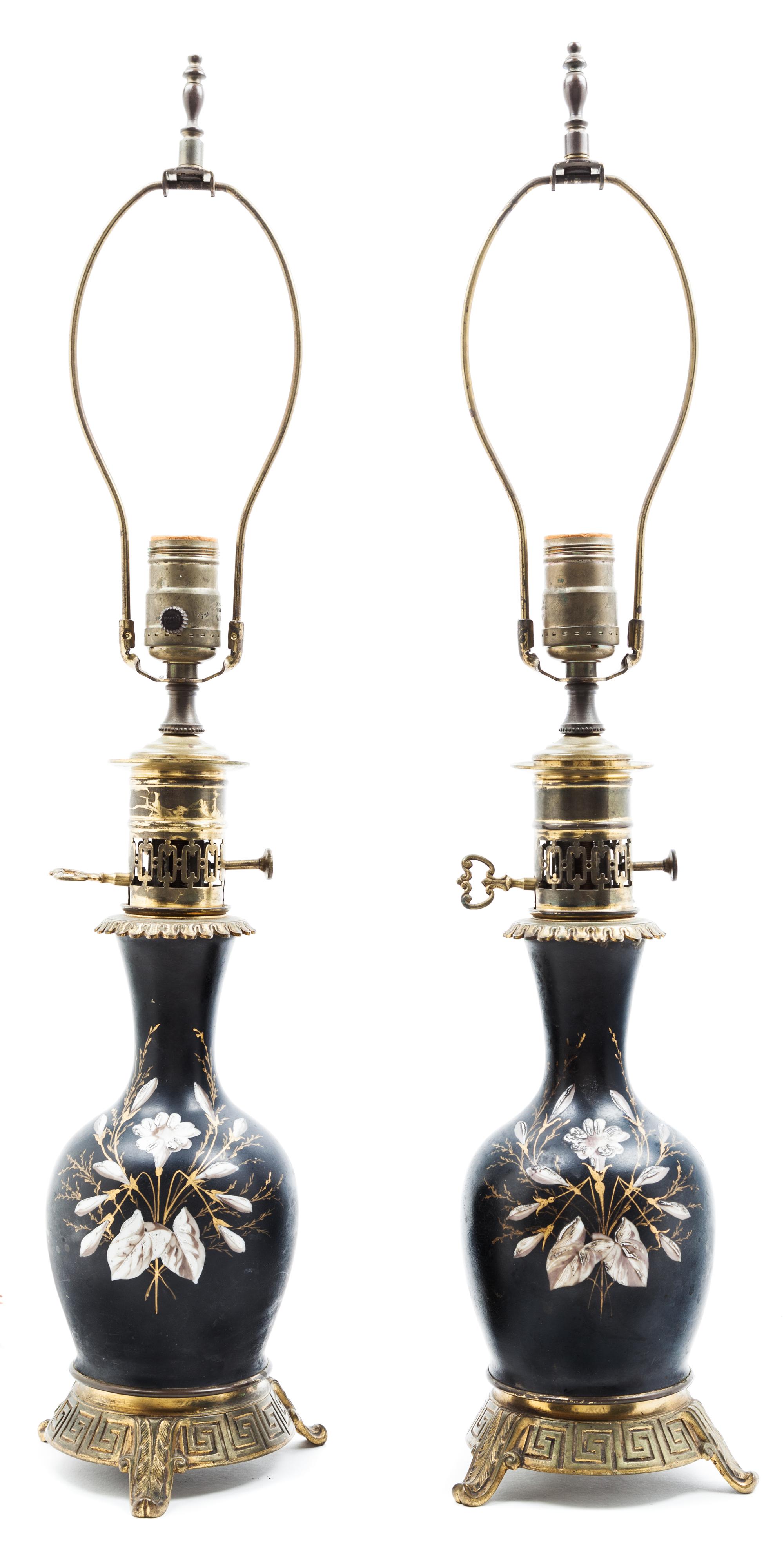 A Pair of Painted Ceramic Lamps Height overall 25 inches.
