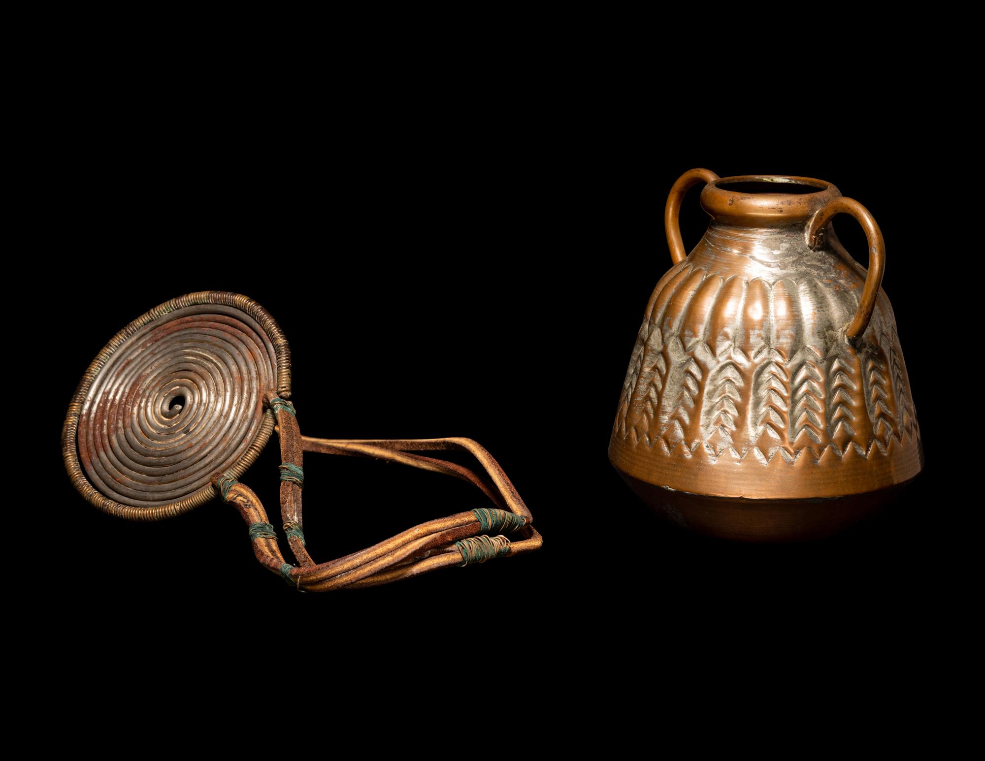 An African Metalwork Pendant and Copper Jar
