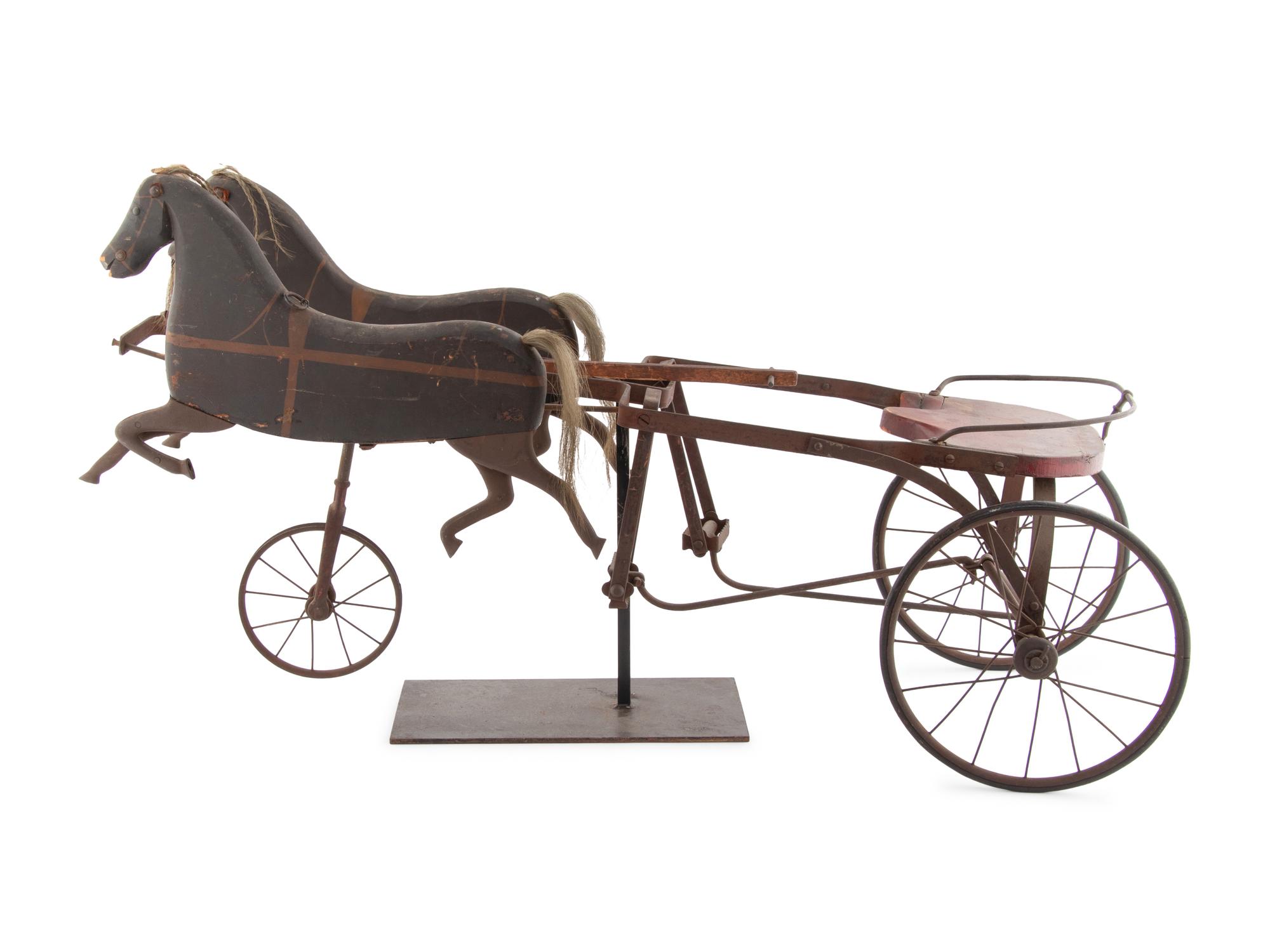 A Child's Carved Wood and Wrought Iron Two Horse Pedal Wagon