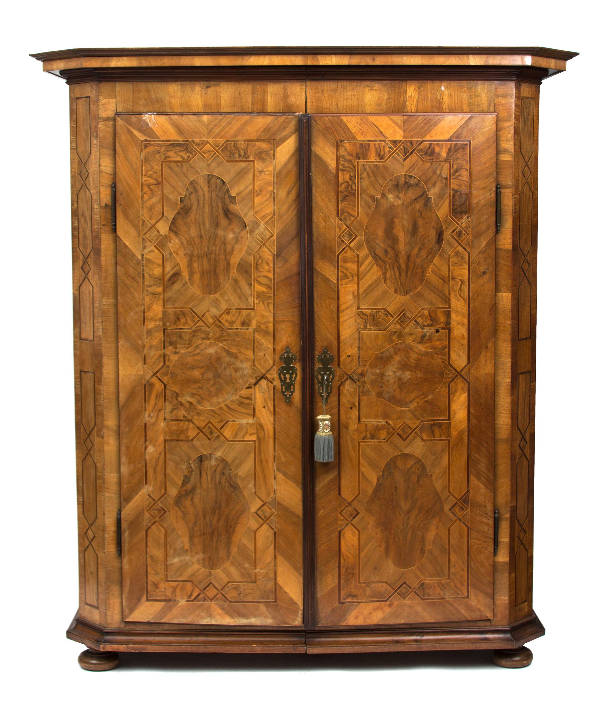 A South German Walnut Parquetry Armoire Height 77 1/2 x width 67 x depth 26 inches. — 18TH CENTURY