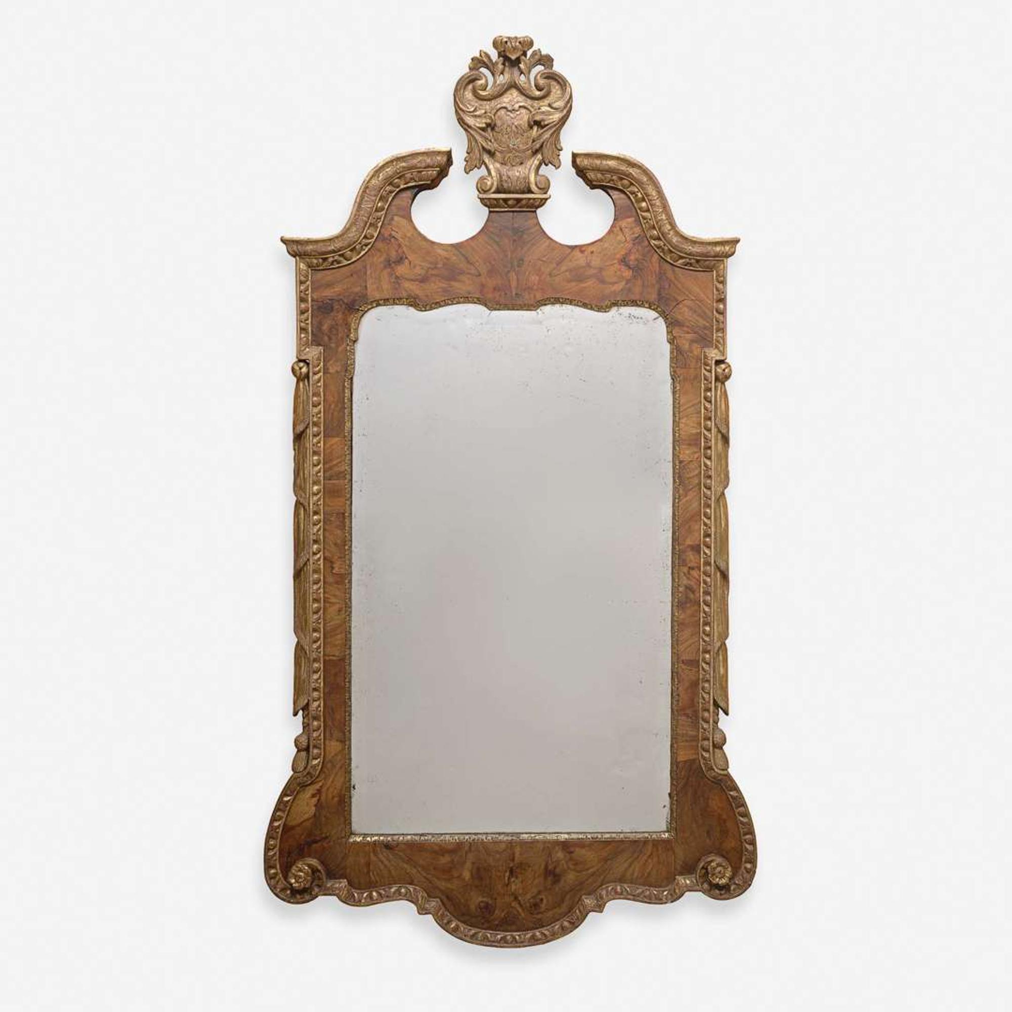A George II Parcel-Gilt Figured Walnut Mirror circa 1730