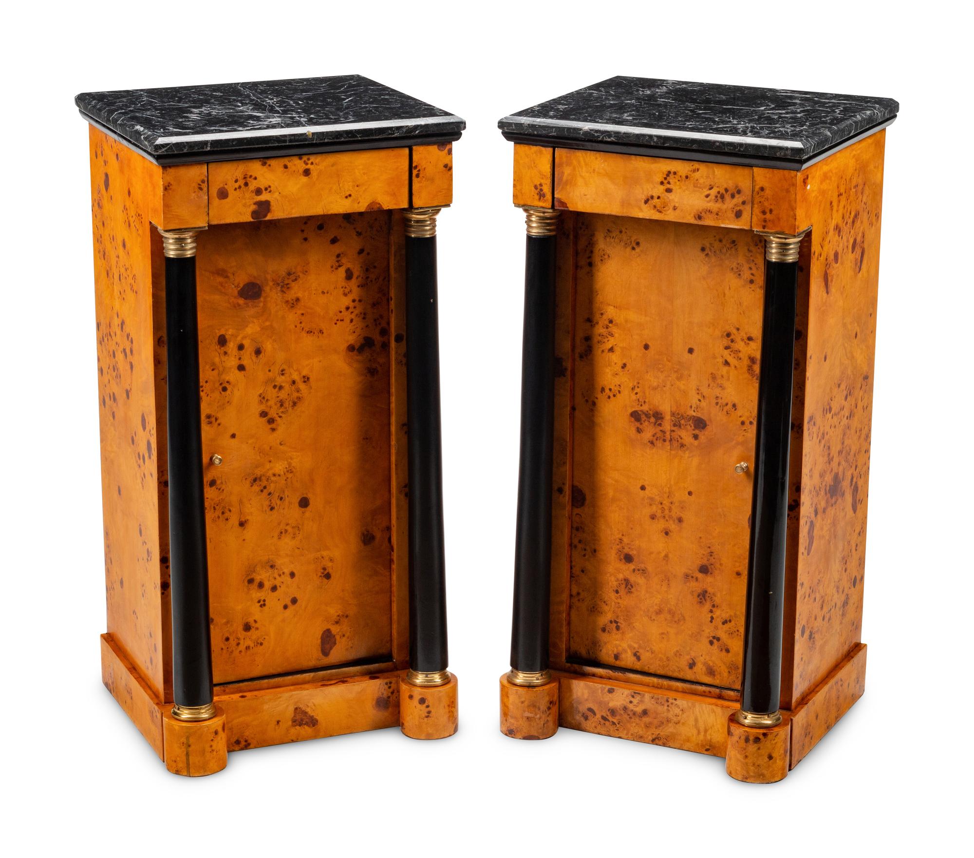 A Pair of Empire Style Part-Ebonized Burlwood Marble-Top Side Cabinets