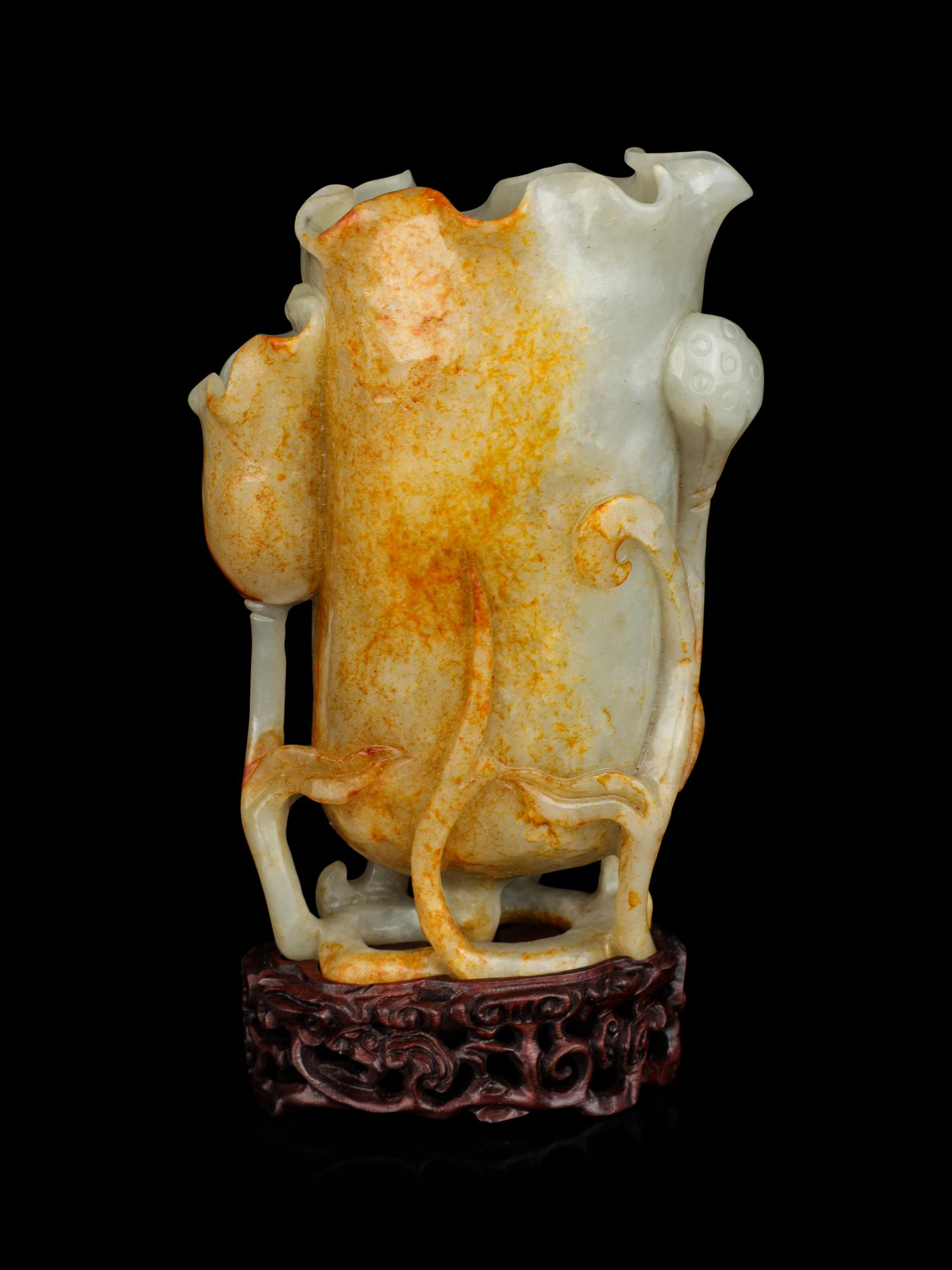 A Russet and Celadon Jade Lotus Cup