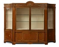A French Gilt Metal Breakfront Cabinet