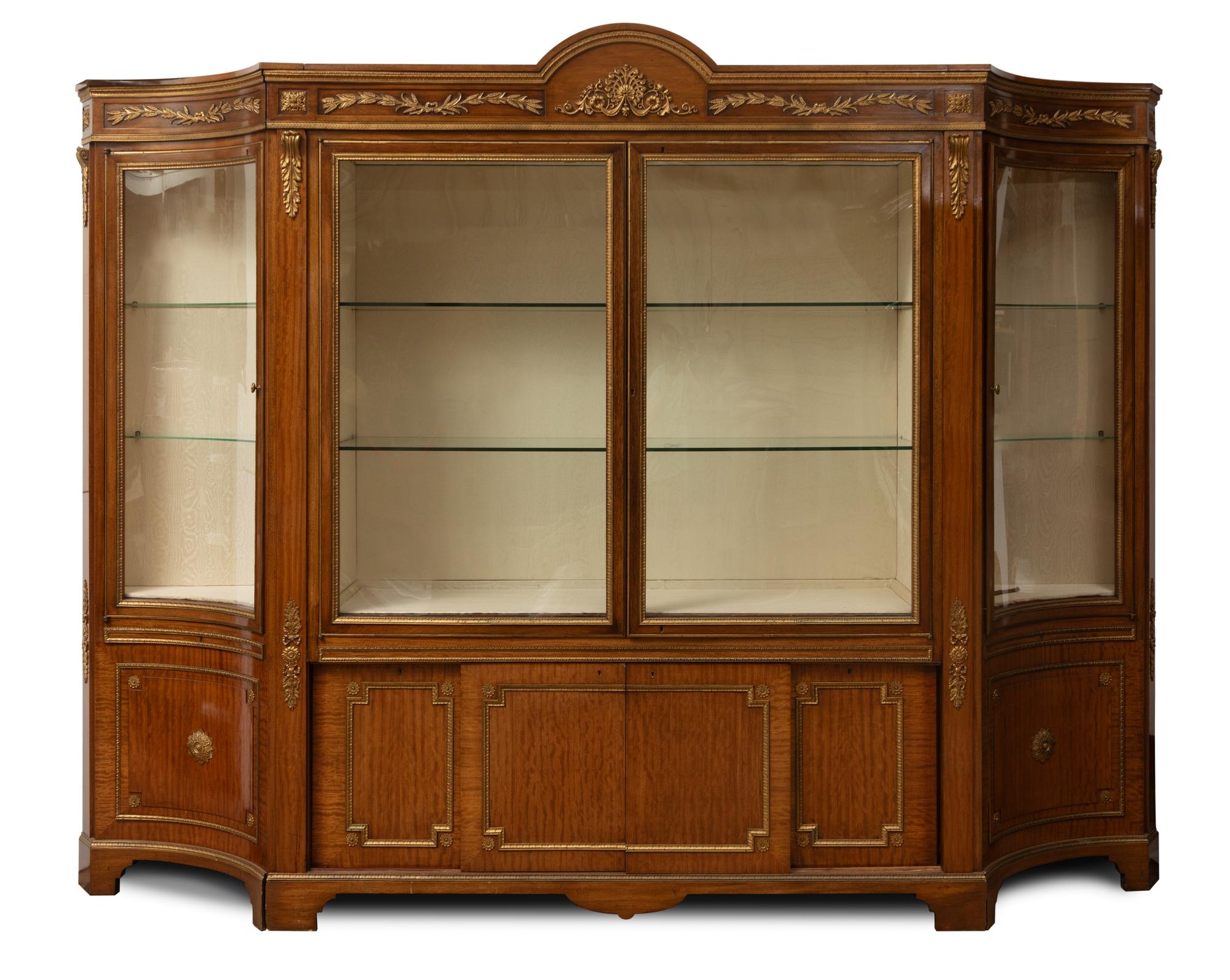 A French Gilt Metal Breakfront Cabinet