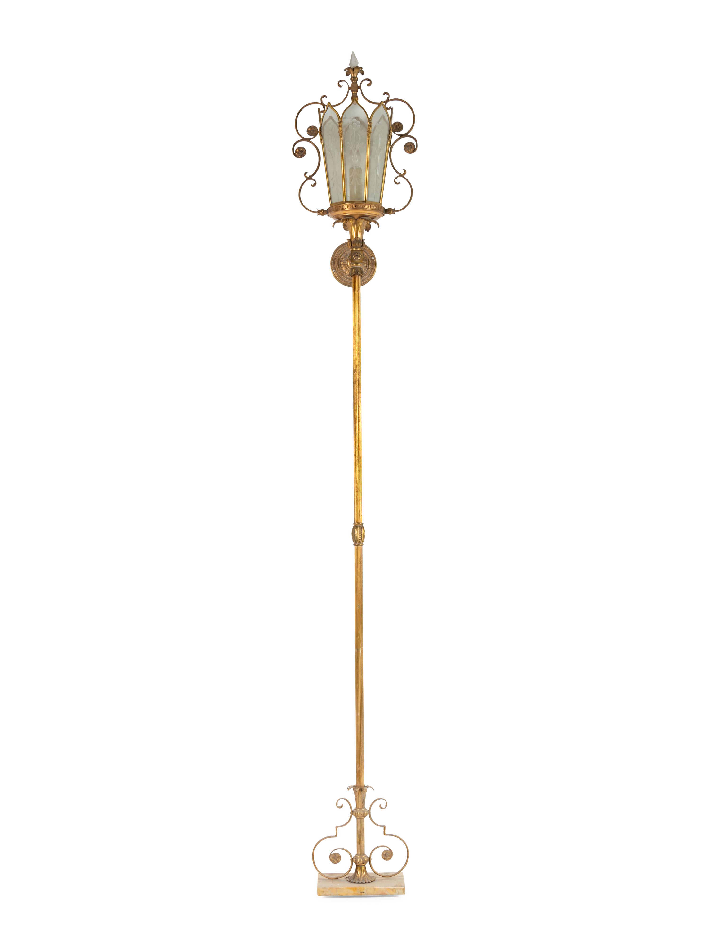 A Gilt Metal and Glass Wall Light
