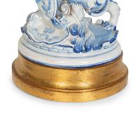 A Continental Faience Lion Group Mounted as a Lamp