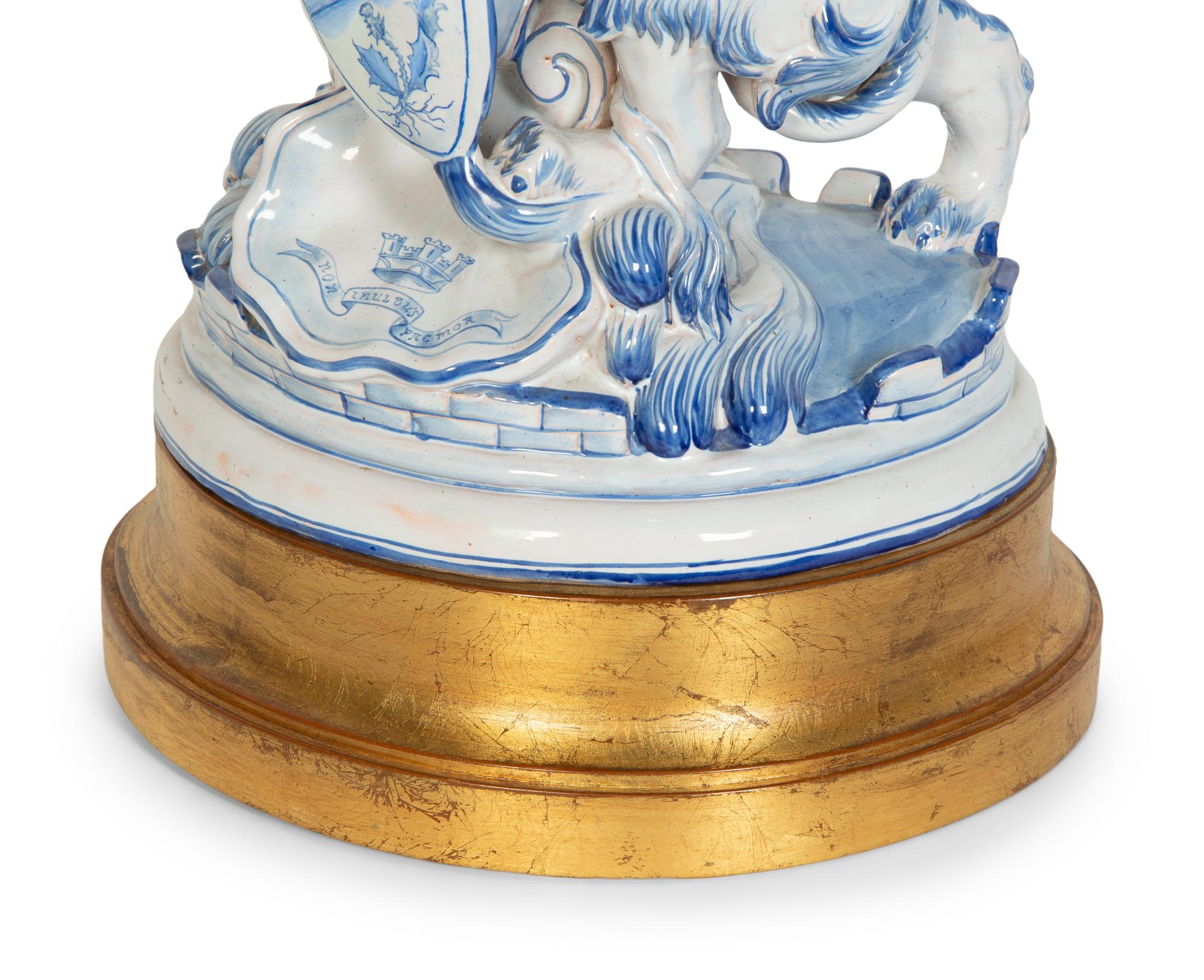A Continental Faience Lion Group Mounted as a Lamp