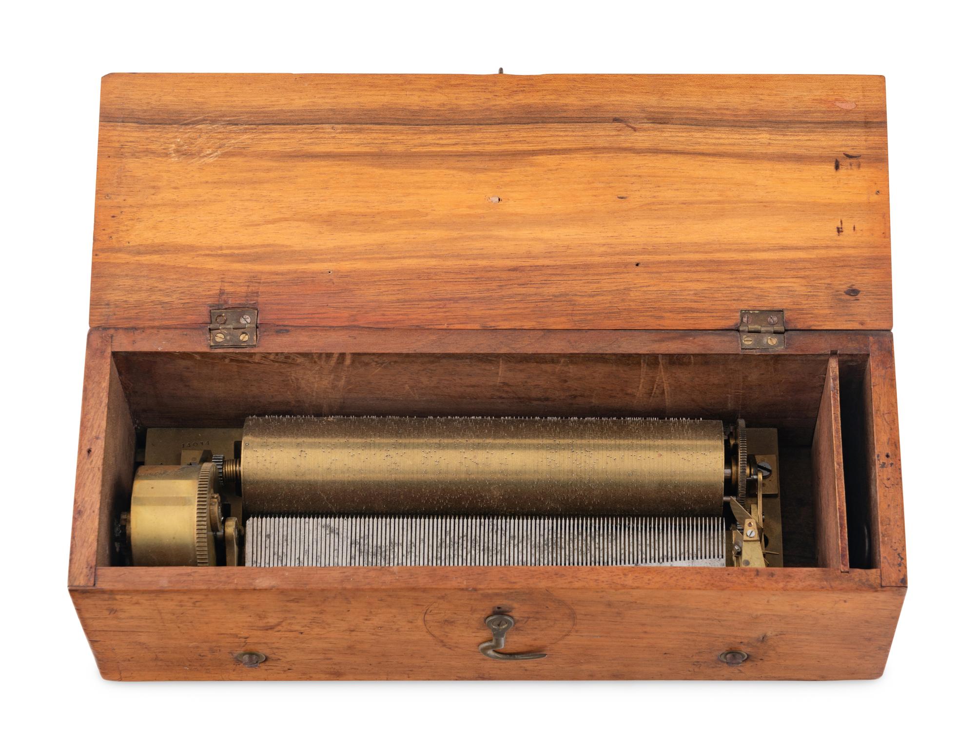 An Key-Wind Four-Air Music Box by F. Nicole