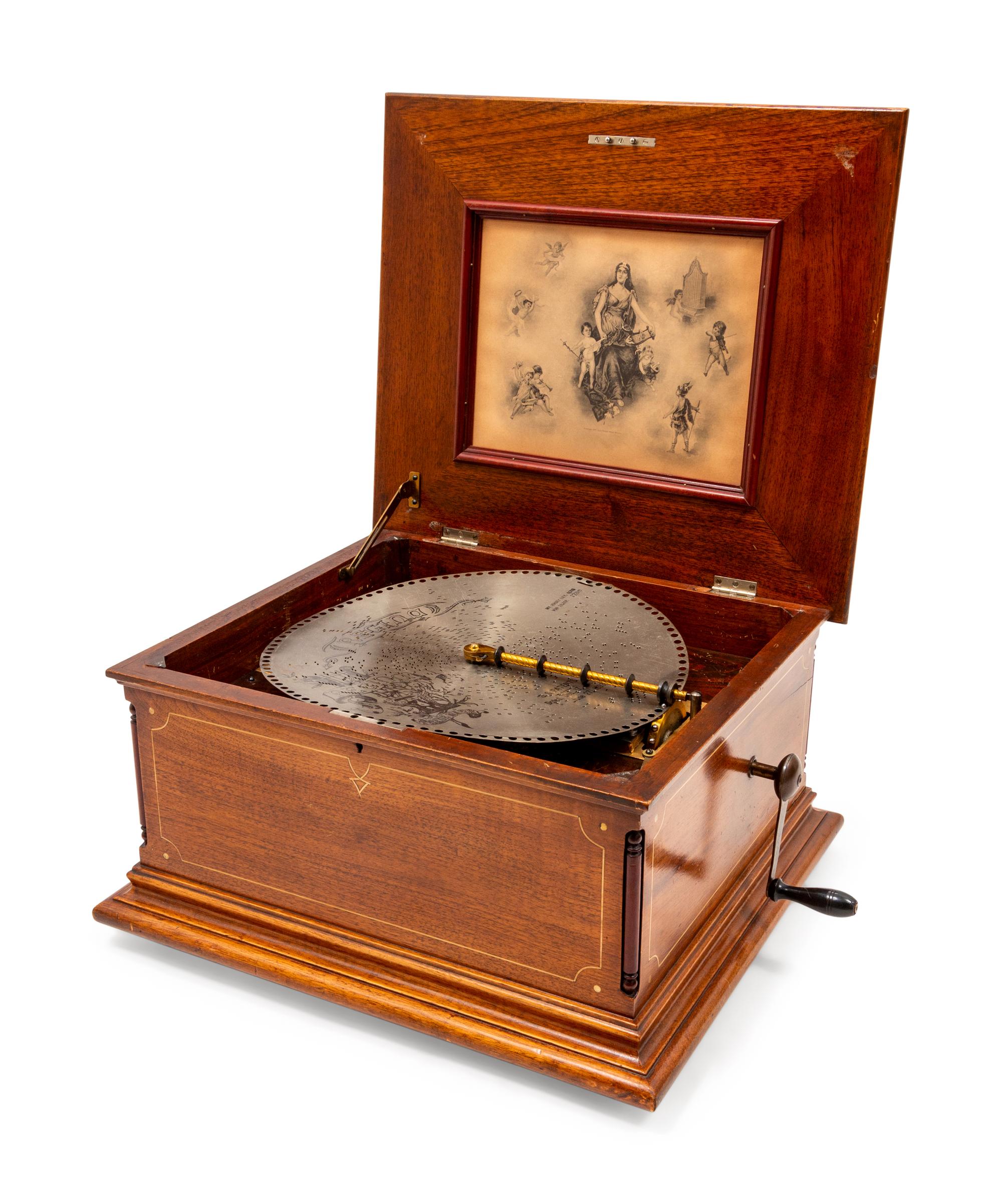 A Regina 15 1/2 Inch Disc Music Box with Inlay