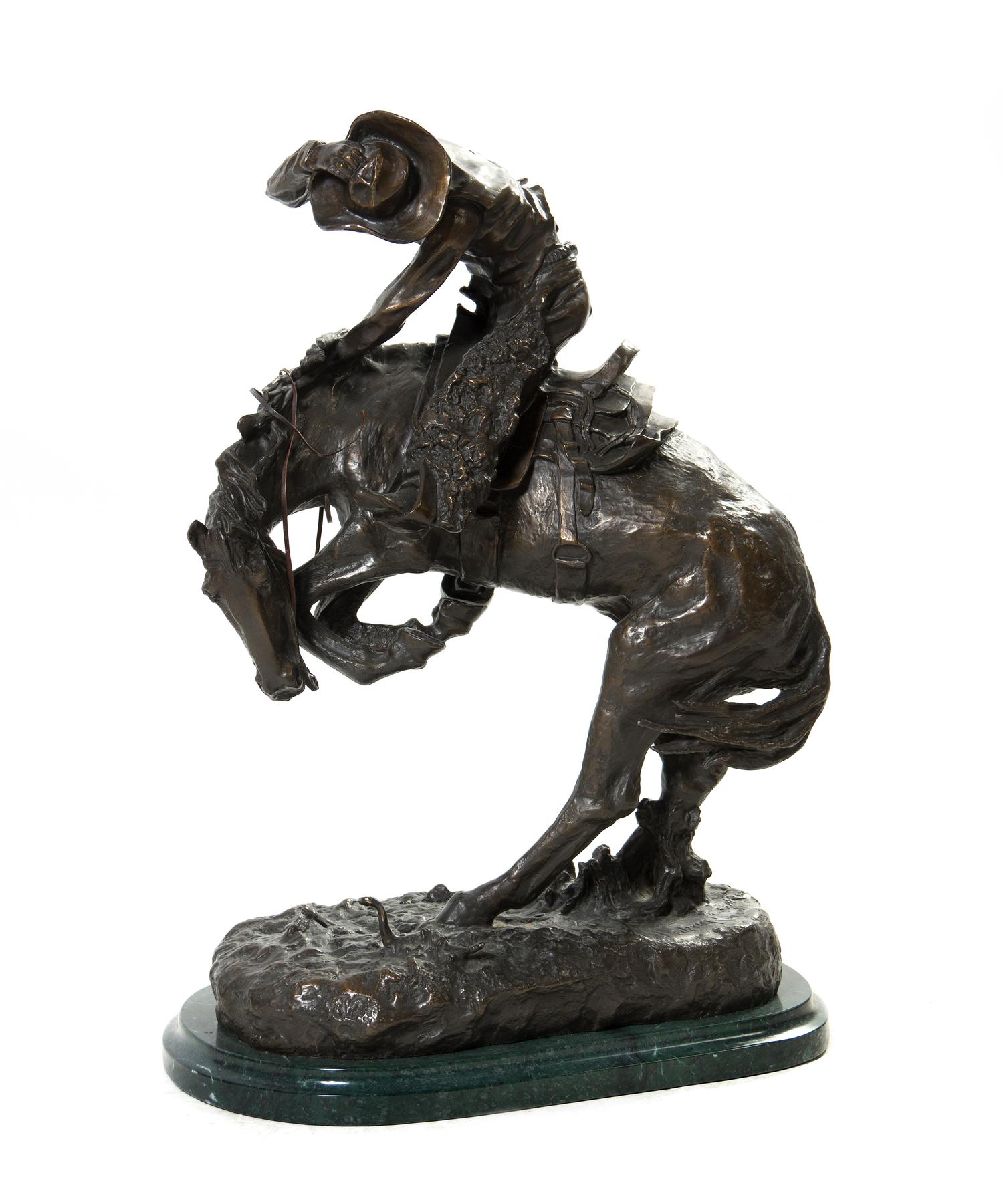 An American Bronze Figural Group, after Frederic Remington (1861-1909), Height 22 1/4 inches.
