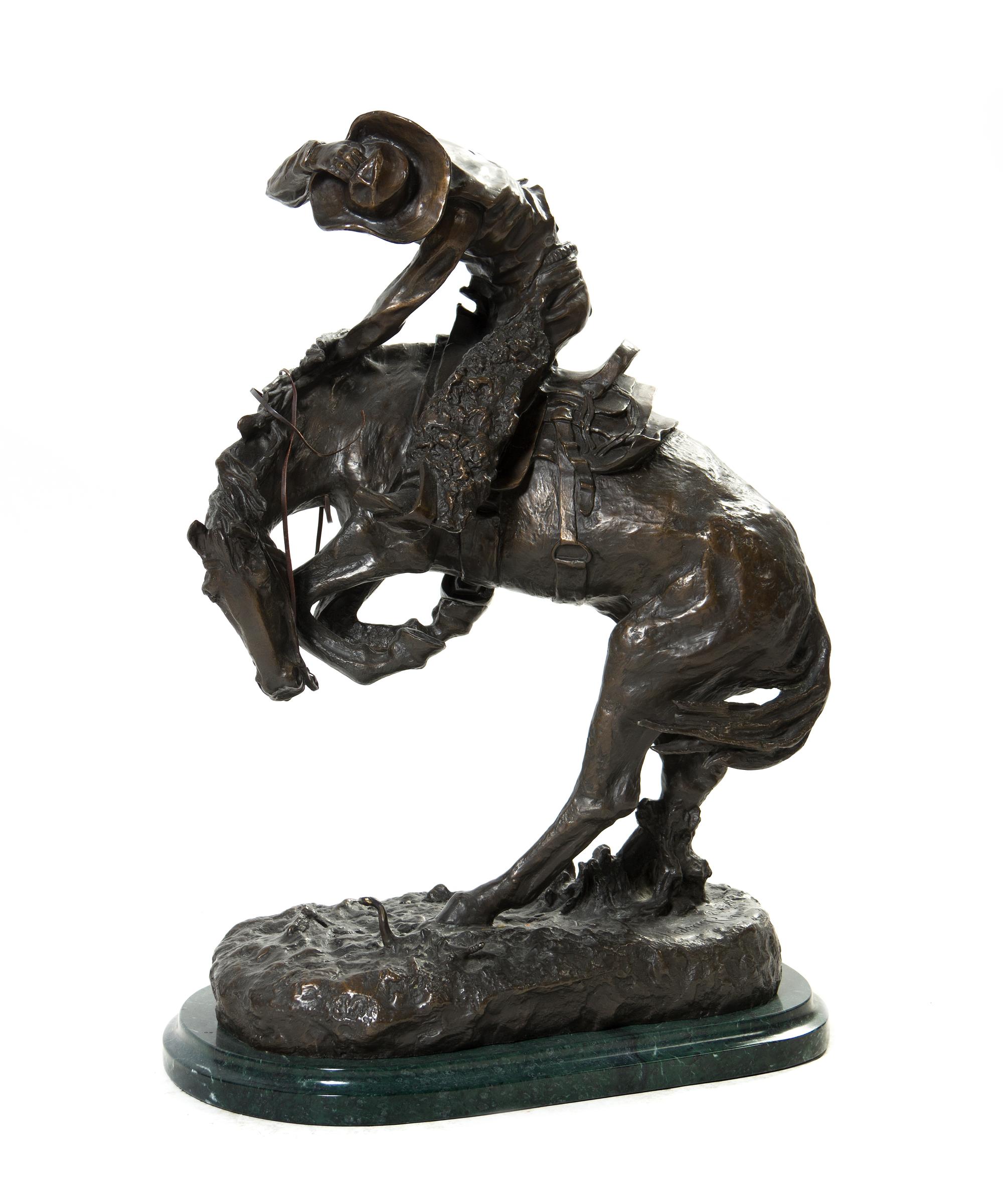 An American Bronze Figural Group, after Frederic Remington (1861-1909), Height 22 1/4 inches.