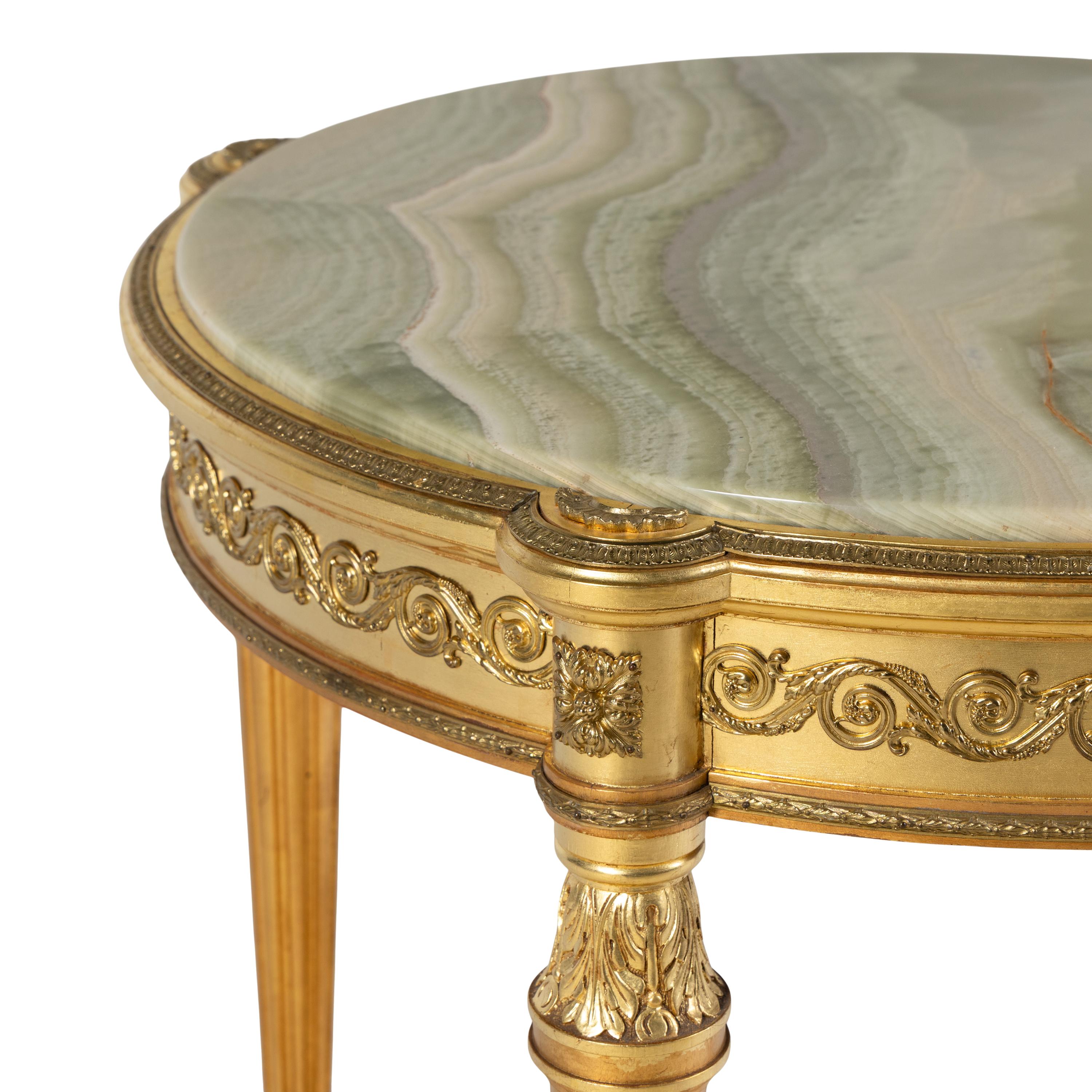 A Louis XVI Style Giltwood and Onyx Top Occasional Table