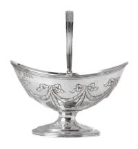 An English Silver Handled Basket, Charles Stuart Harris, London, 1883-84, with a swing handle and engraved swag decoration.