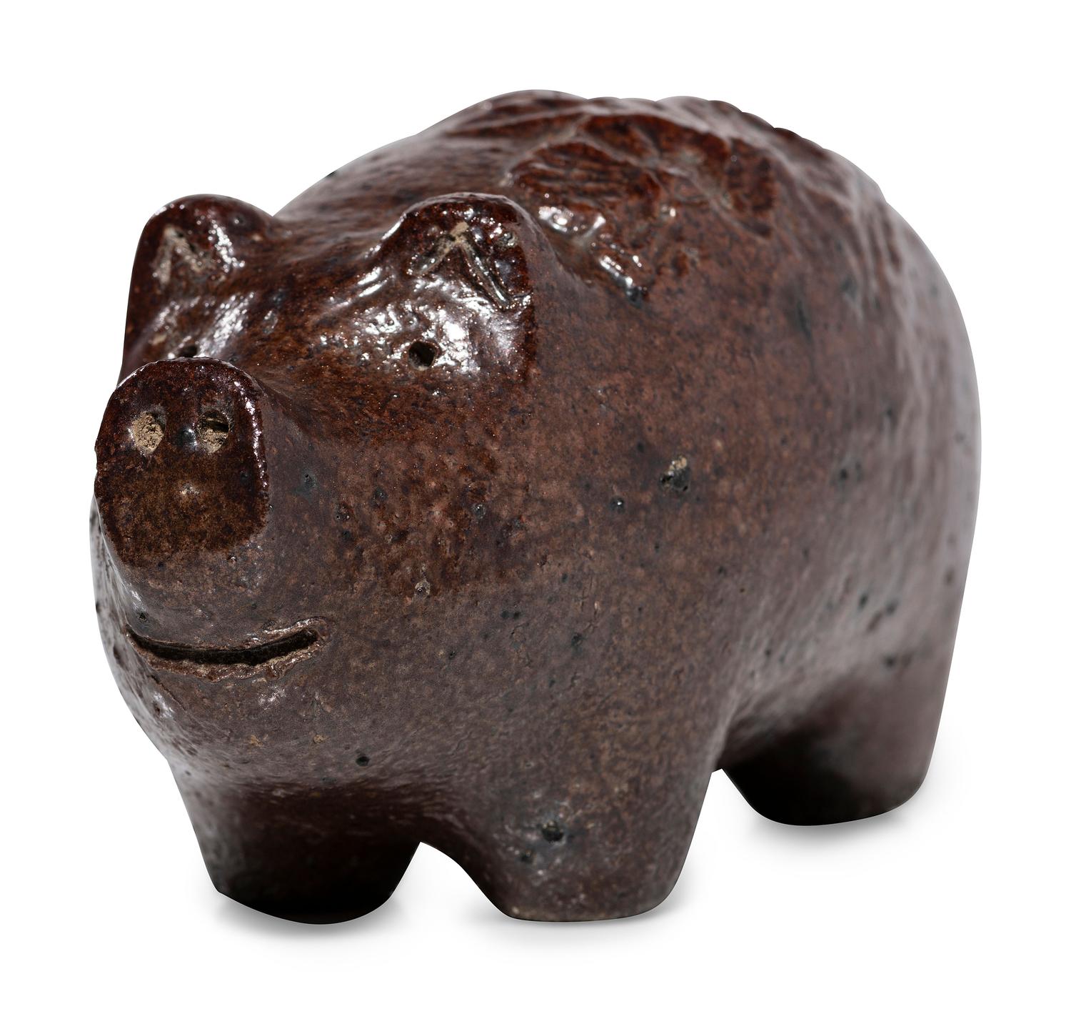 An Ohio Brown-Glazed Sewer Tile Pig
