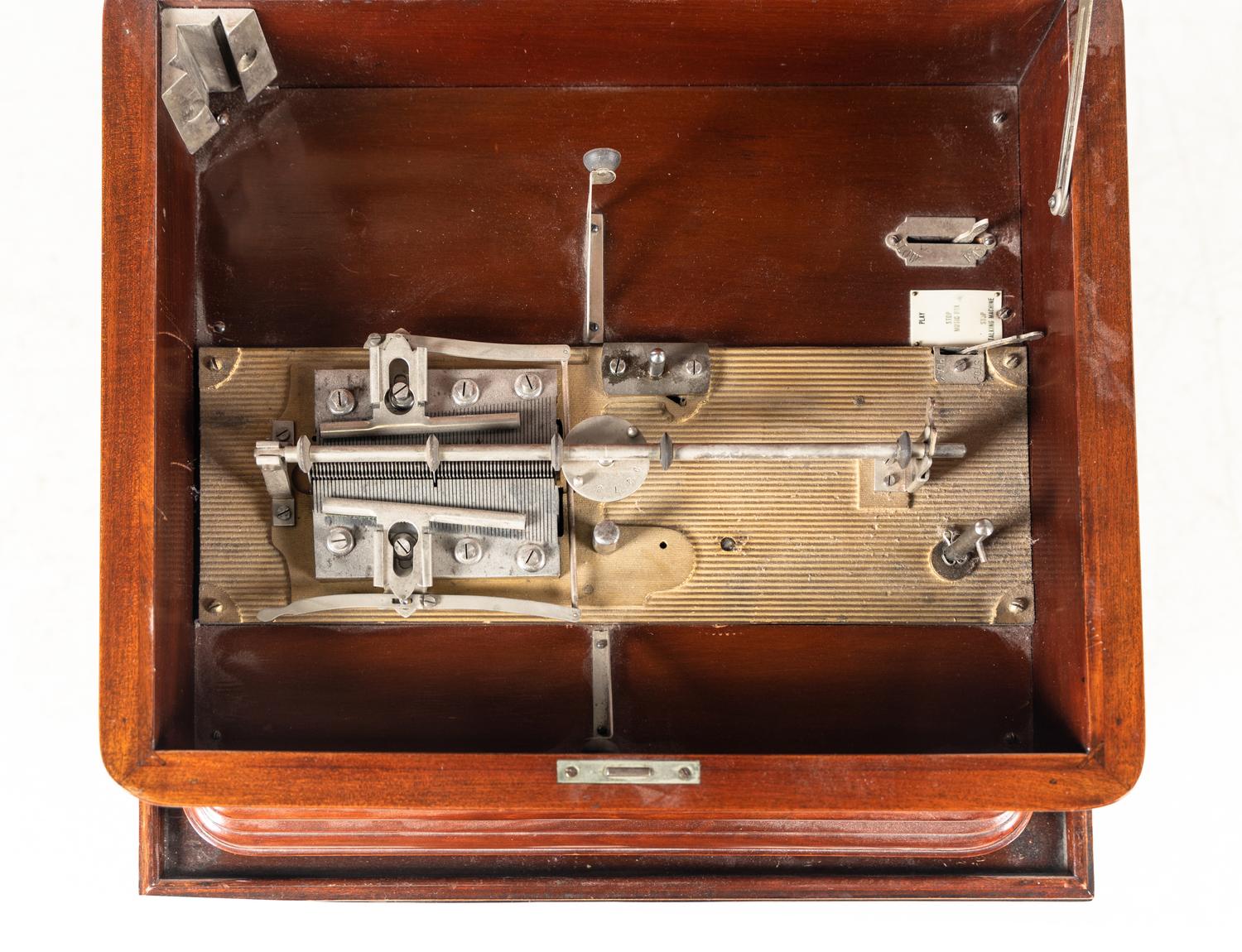 A Miraphone Combination 12-Inch Disk Music Box and Phonograph