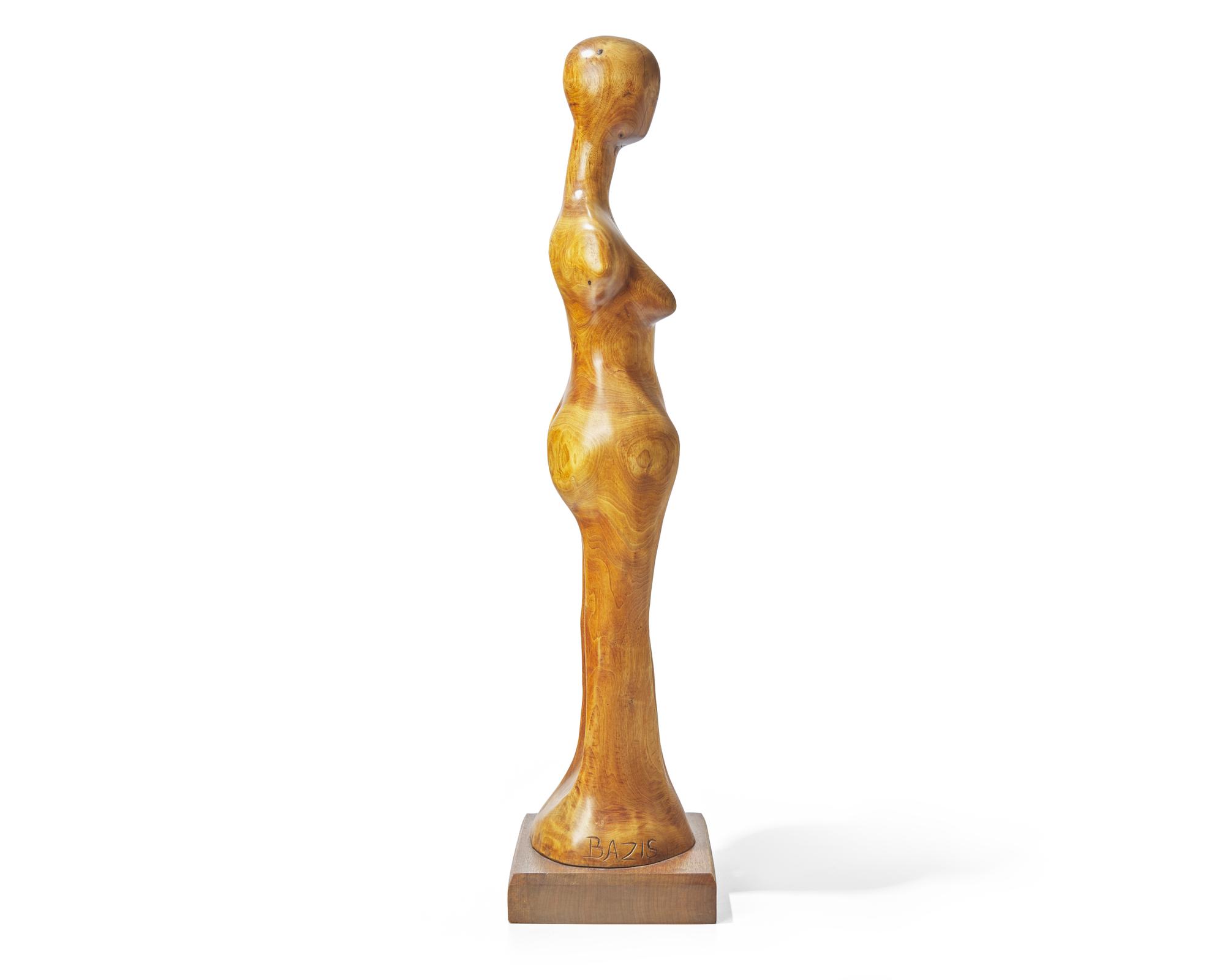 Tom Bazis (b. 1943), A wood carving of a female figure
