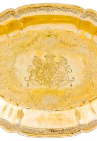 A Belgian Silver-Gilt Serving Dish of English Ducal Interest, Maker's Mark GV, Liege, 18th Century, of oval form, the undulating rim ch