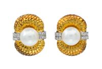 A Pair of 14 Karat Gold, Cultured Pearl and Diamond Earclips, 16.90 dwts.