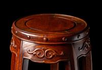 A Chinese Hardwood Barrel-Form Stand, Huaji
