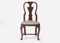 A Queen Anne walnut and walnut veneer balloon seat side chair, Ireland, circa 1725