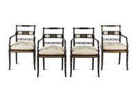 A Set of Four Regency Style Painted and Parcel Gilt Armchairs