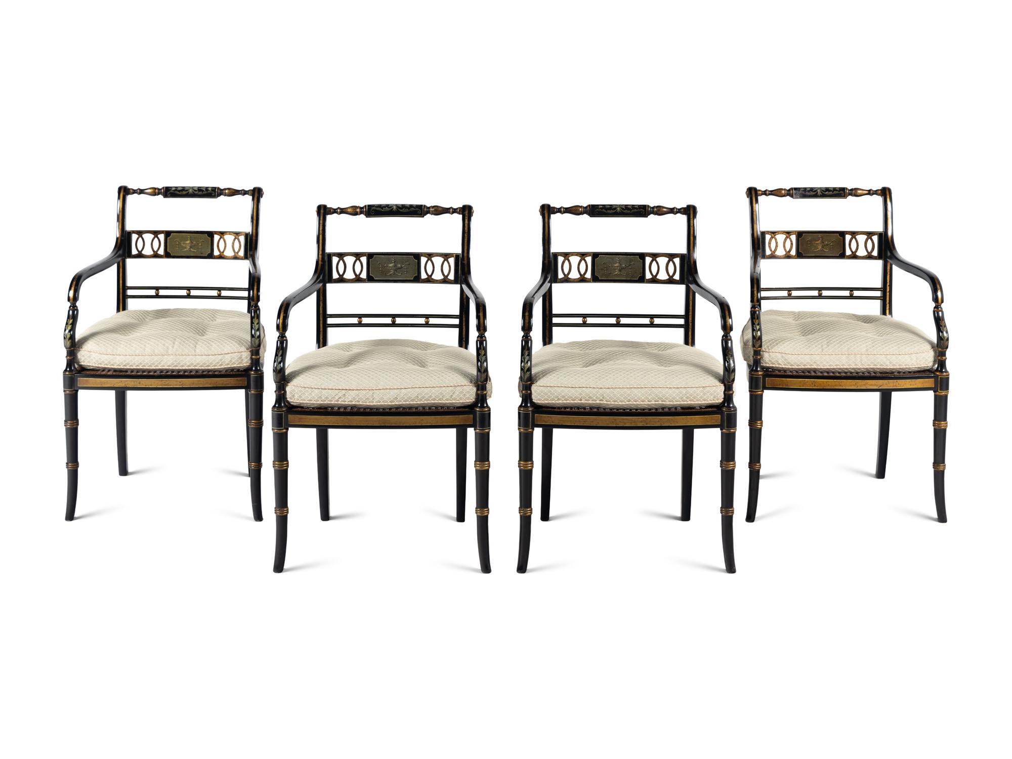 A Set of Four Regency Style Painted and Parcel Gilt Armchairs