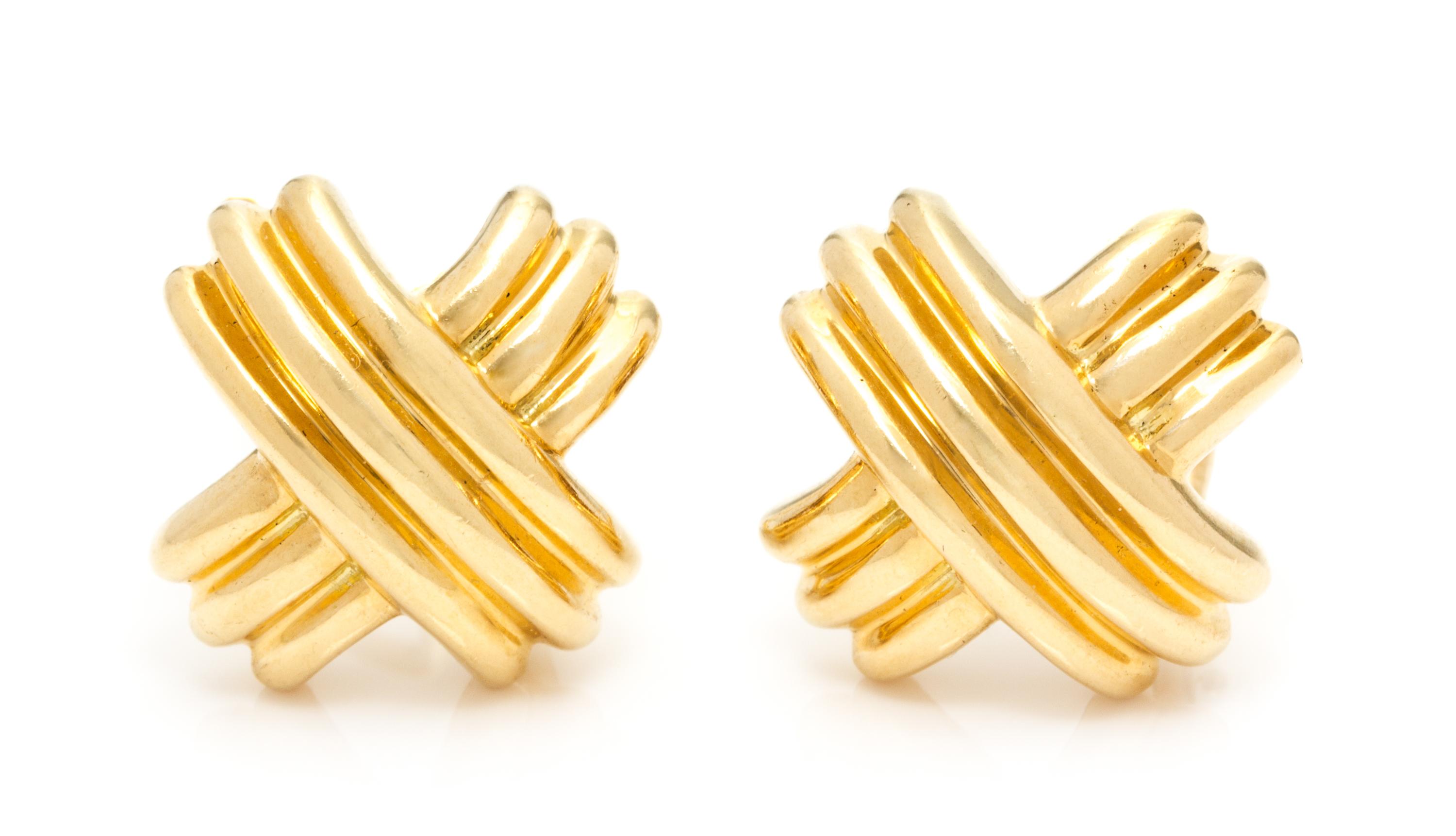 A Pair of 18 Karat Yellow Gold "Signature" Earclips, Tiffany & Co., 10.00 dwts.