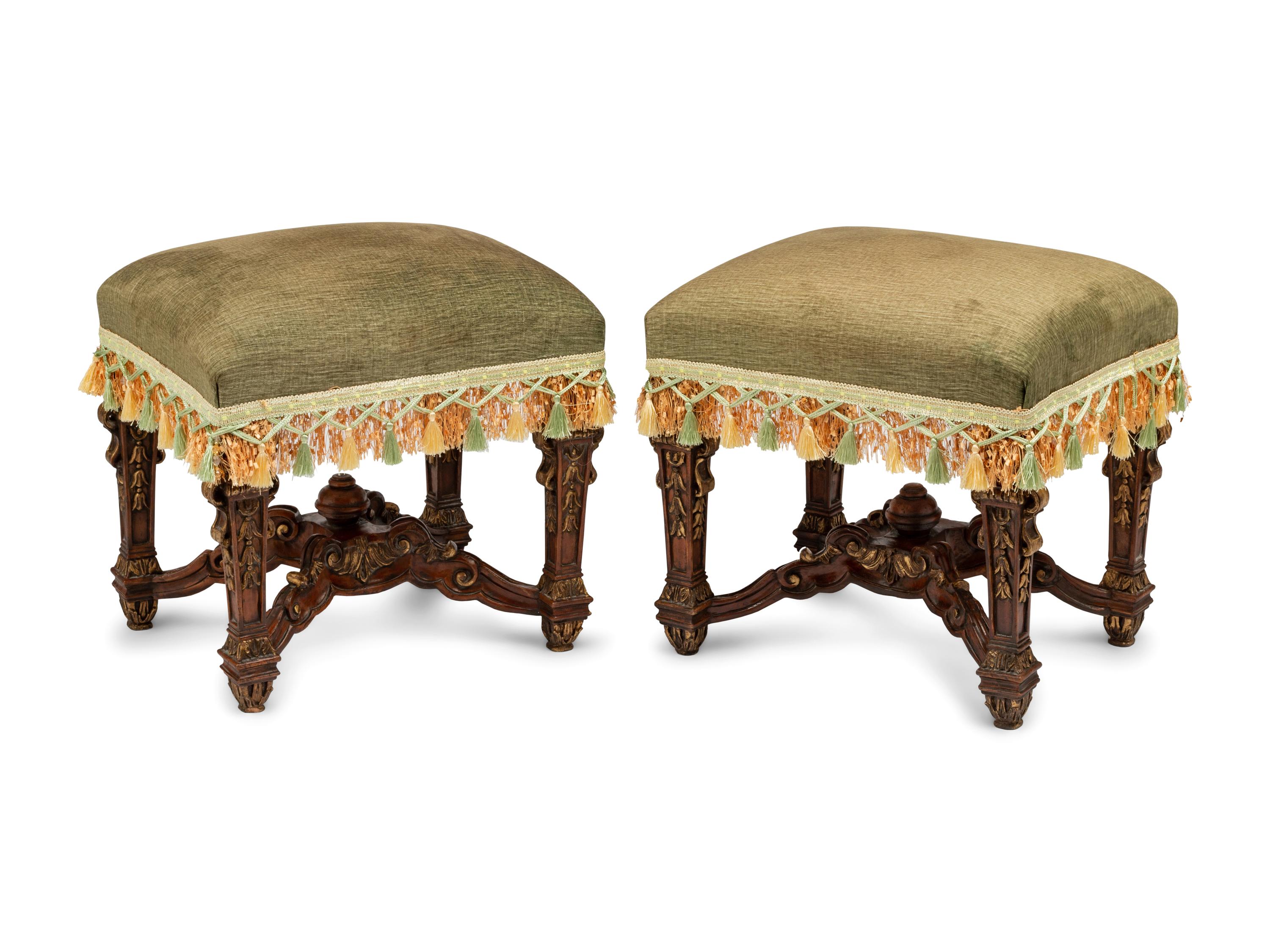 A Pair of Louis XIV Style Carved and Parcel Gilt Tabourets