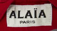 A Pair of Alaia Red Pleated Pants, Size 8.