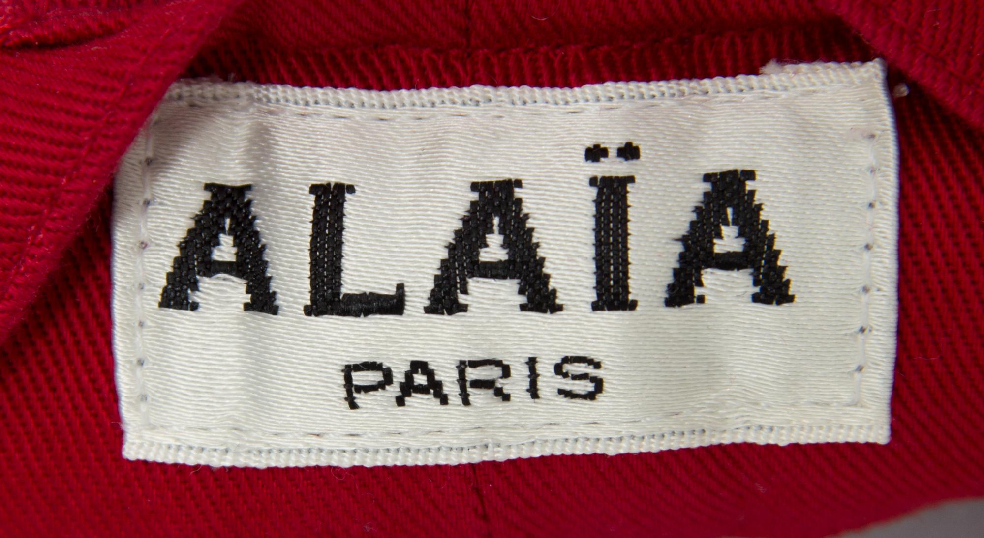 A Pair of Alaia Red Pleated Pants, Size 8.