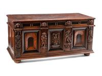 An Italian Carved Oak and Walnut Cassone