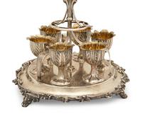 An English Silver Six-Egg Cruet and Footed Silver and Cobalt Glass Basket