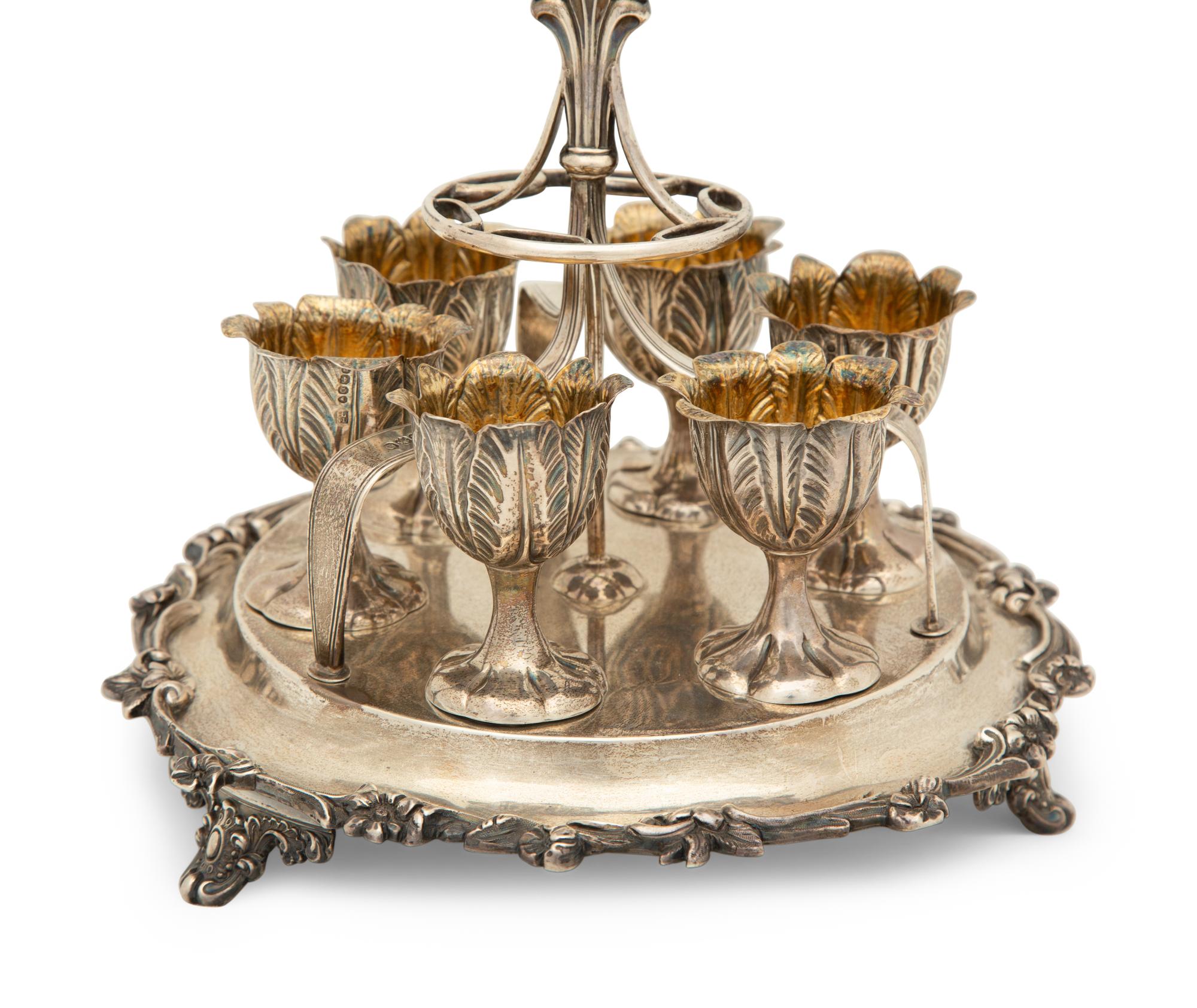 An English Silver Six-Egg Cruet and Footed Silver and Cobalt Glass Basket