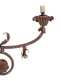 A Pair of Continental Wrought Iron and Tole Sconces
