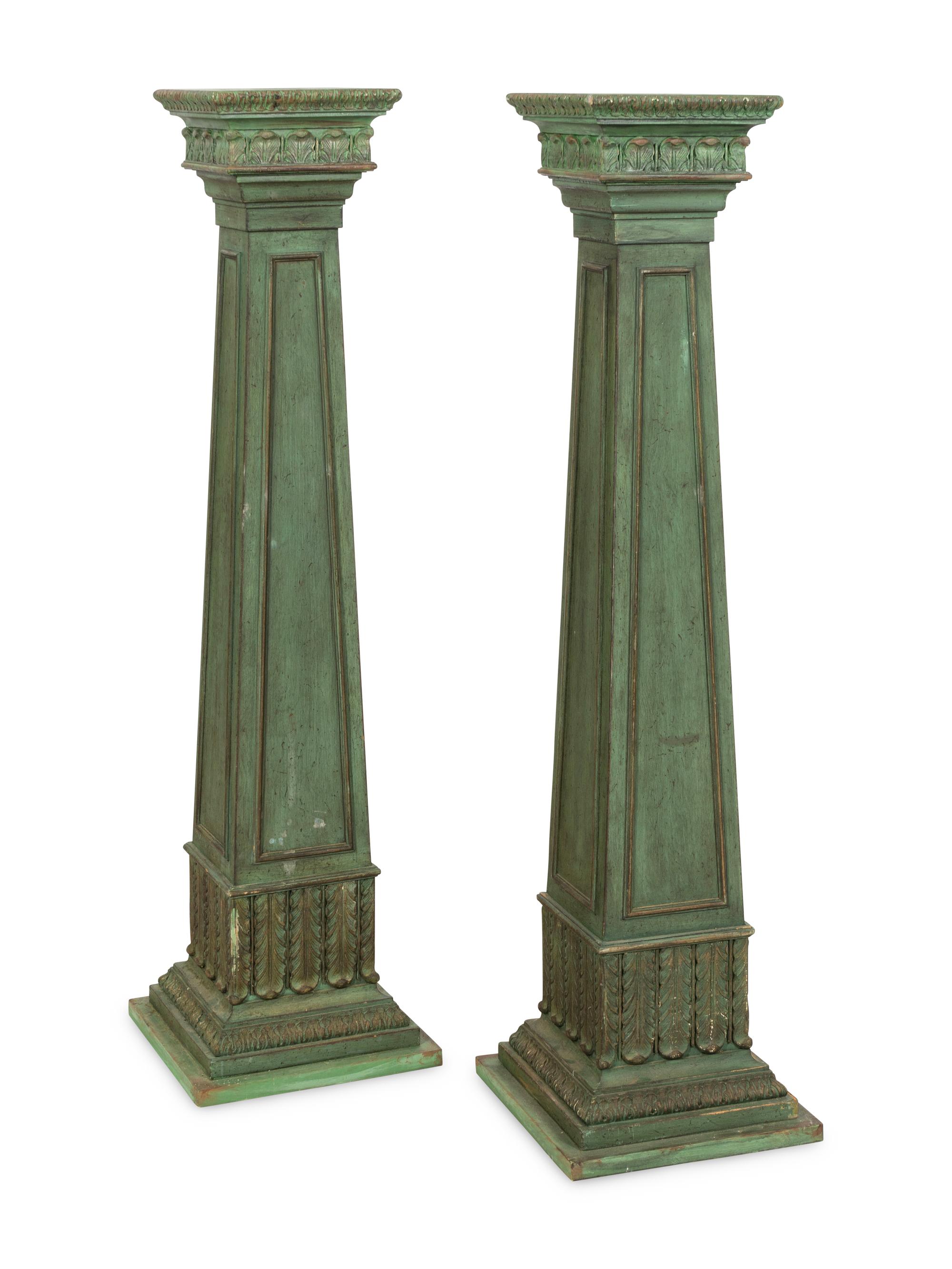 A Pair of Green-Painted Carved Wood Pedestals
