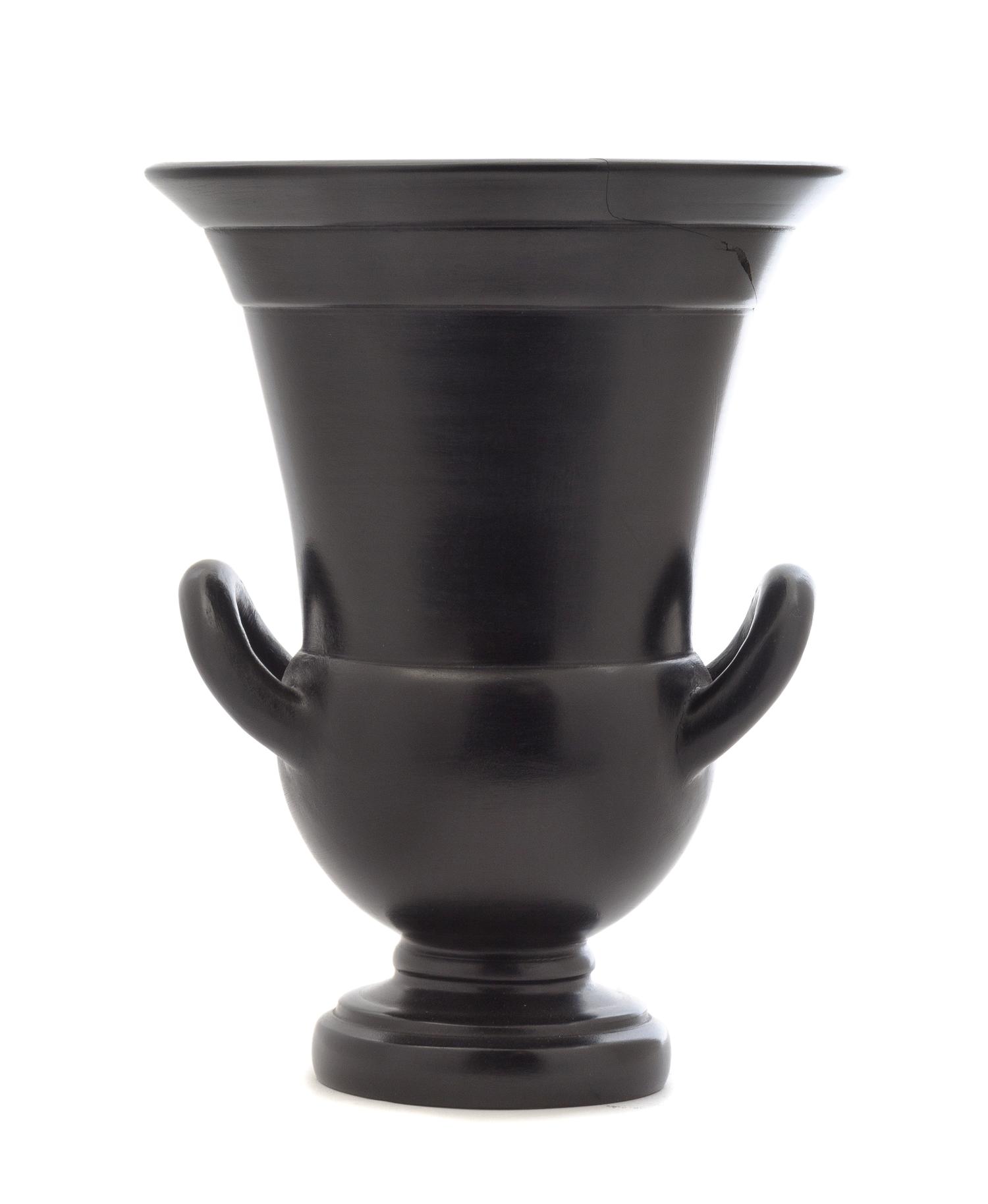 An Italian Black-Fired Urn Height 9 inches. — 20TH CENTURY