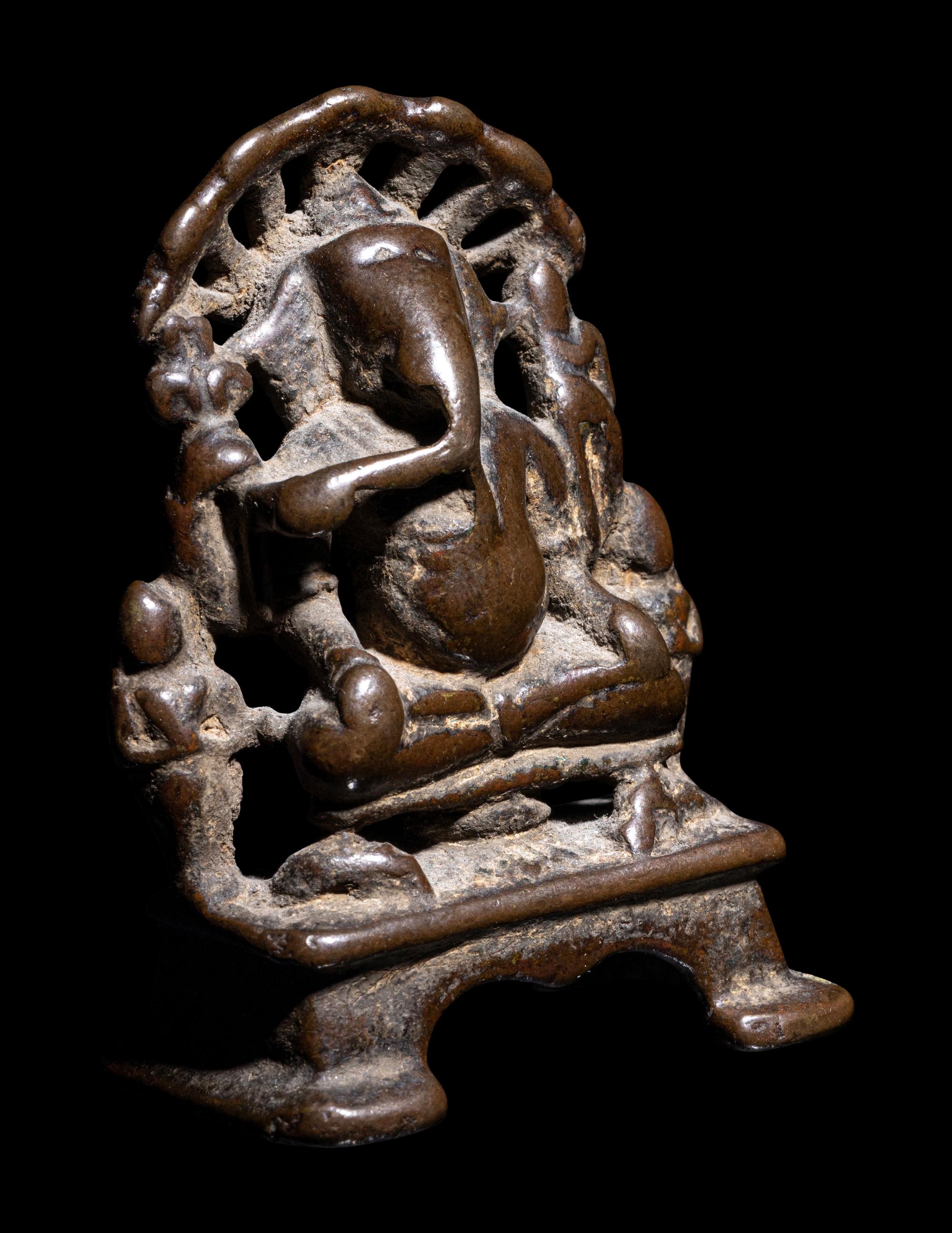 A Small Indian Bronze Figure of Ganesha
